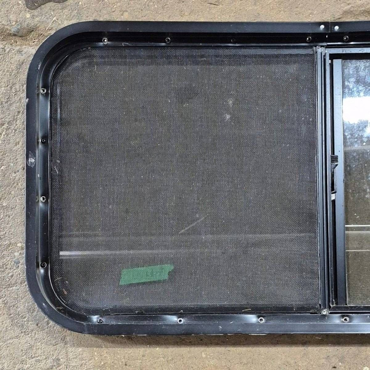 Used Slanted Black Radius Opening Window - 41 1/4" X 17 3/4" X 2" - Young Farts RV Parts