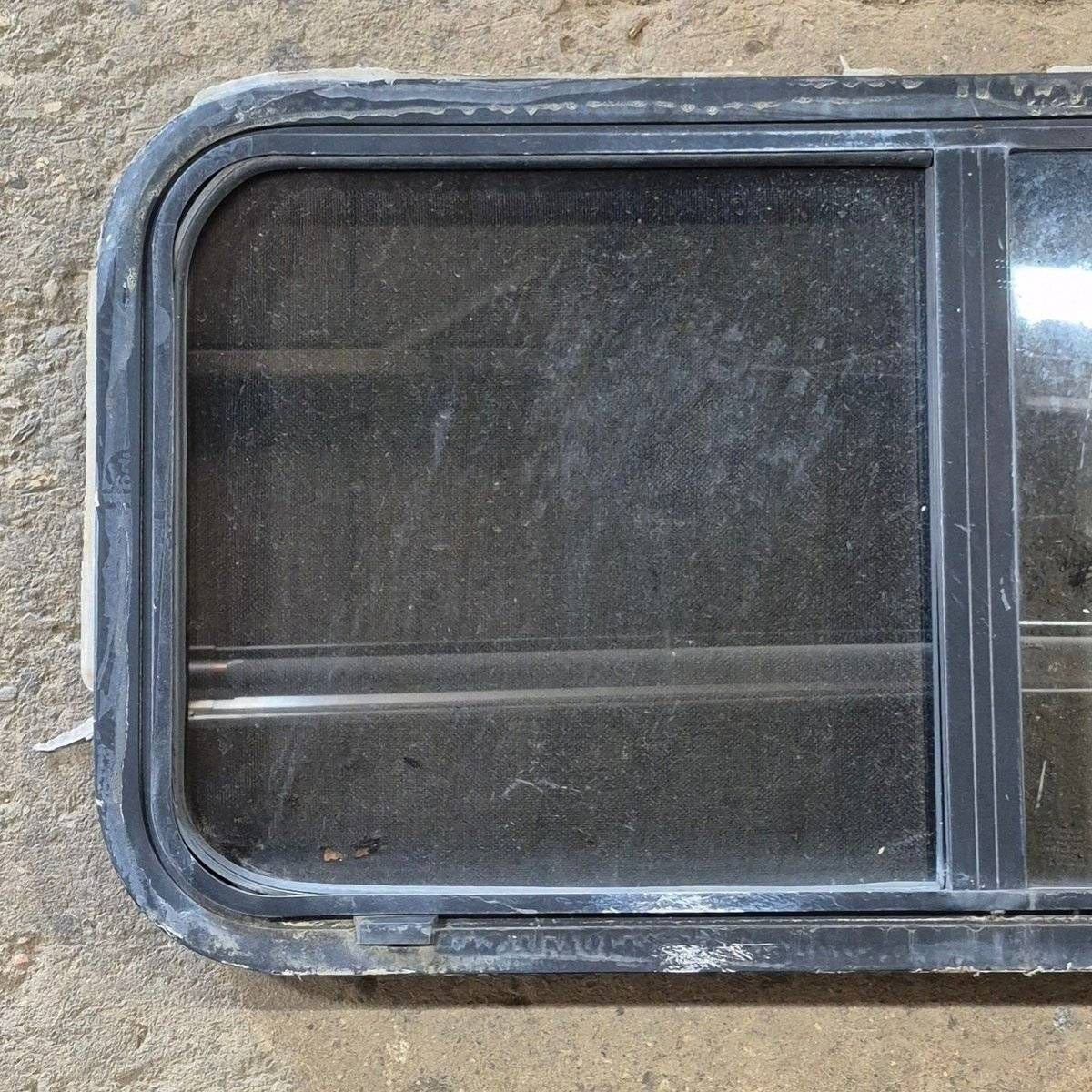 Used Slanted Black Radius Opening Window - 41 1/4