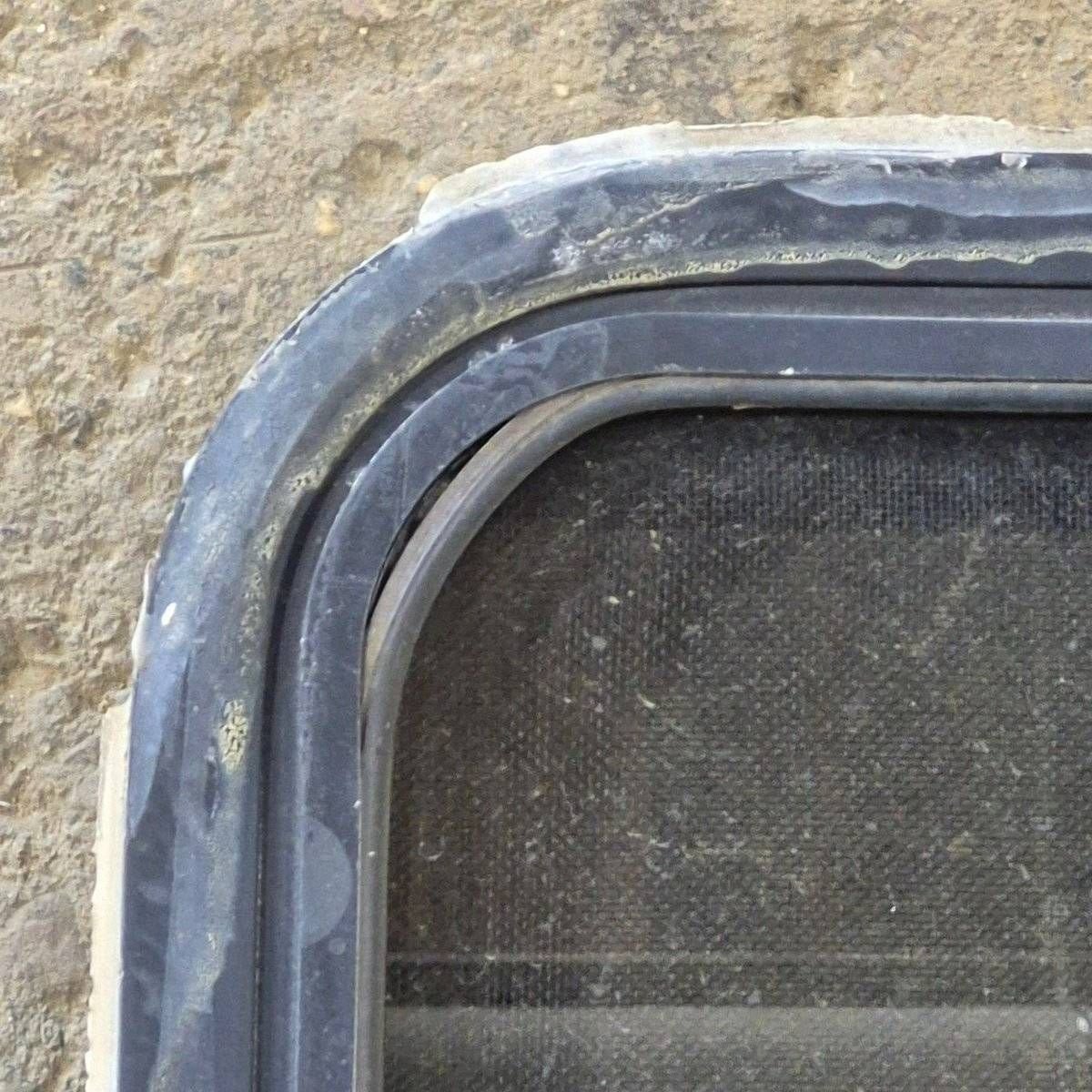Used Slanted Black Radius Opening Window - 41 1/4" X 17 3/4" X 2" - Young Farts RV Parts