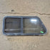 Used Slanted Black Radius Opening Window - 41 1/4" X 17 3/4" X 2" - Young Farts RV Parts