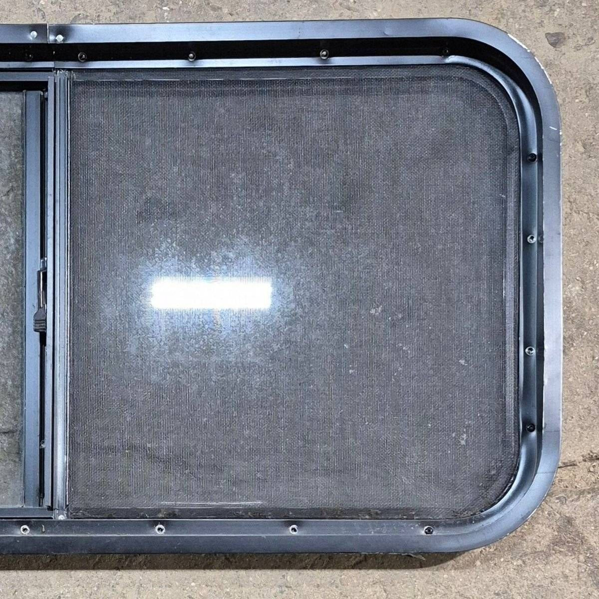 Used Slanted Black Radius Opening Window - 41.75" X 17 1/2" X 1.875" - Young Farts RV Parts