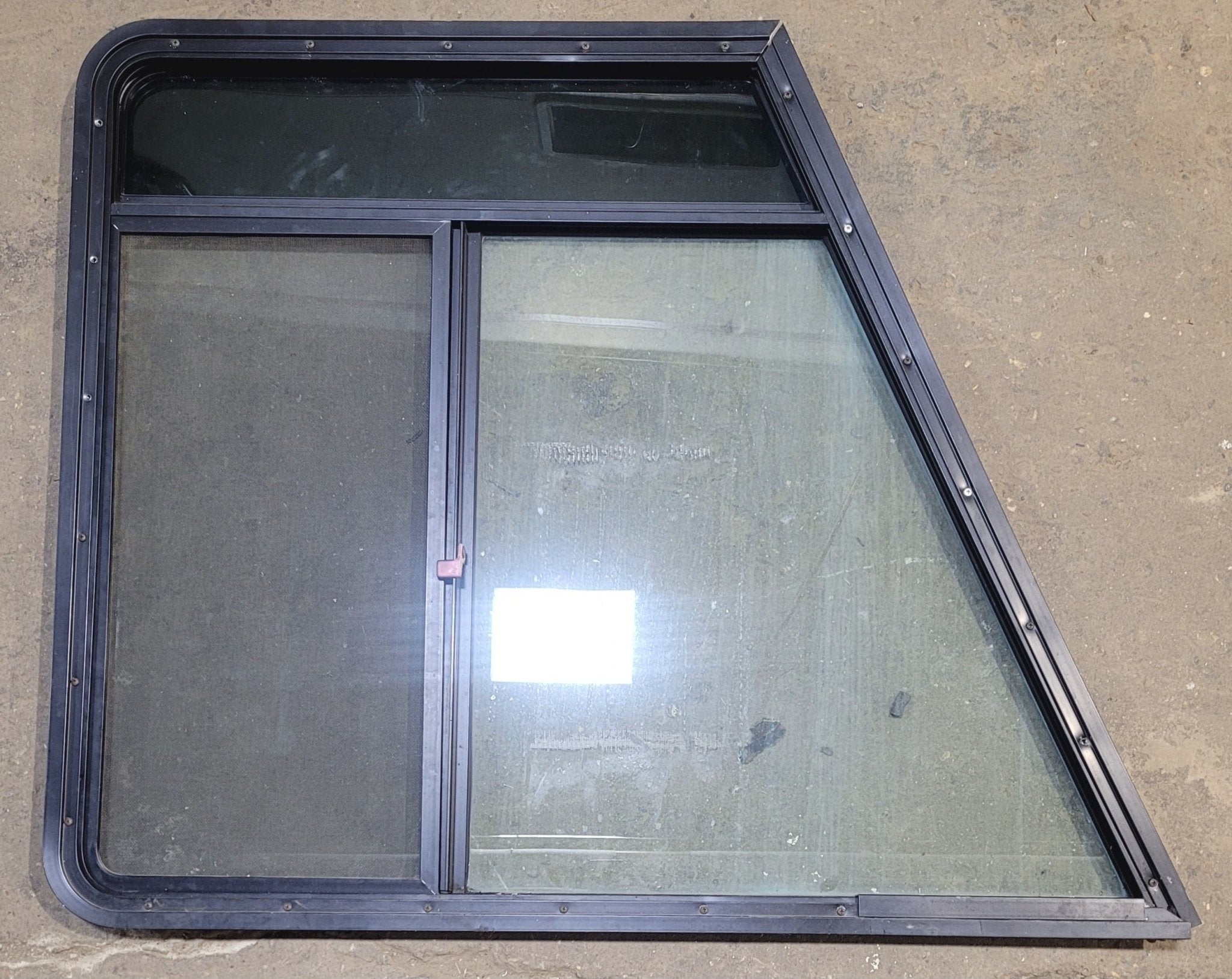 Used Slanted Black Radius Opening Window : 42 1/2" W x 35 1/2" H x 1 3/4" D - Motorhome Front Driver Side - Young Farts RV Parts