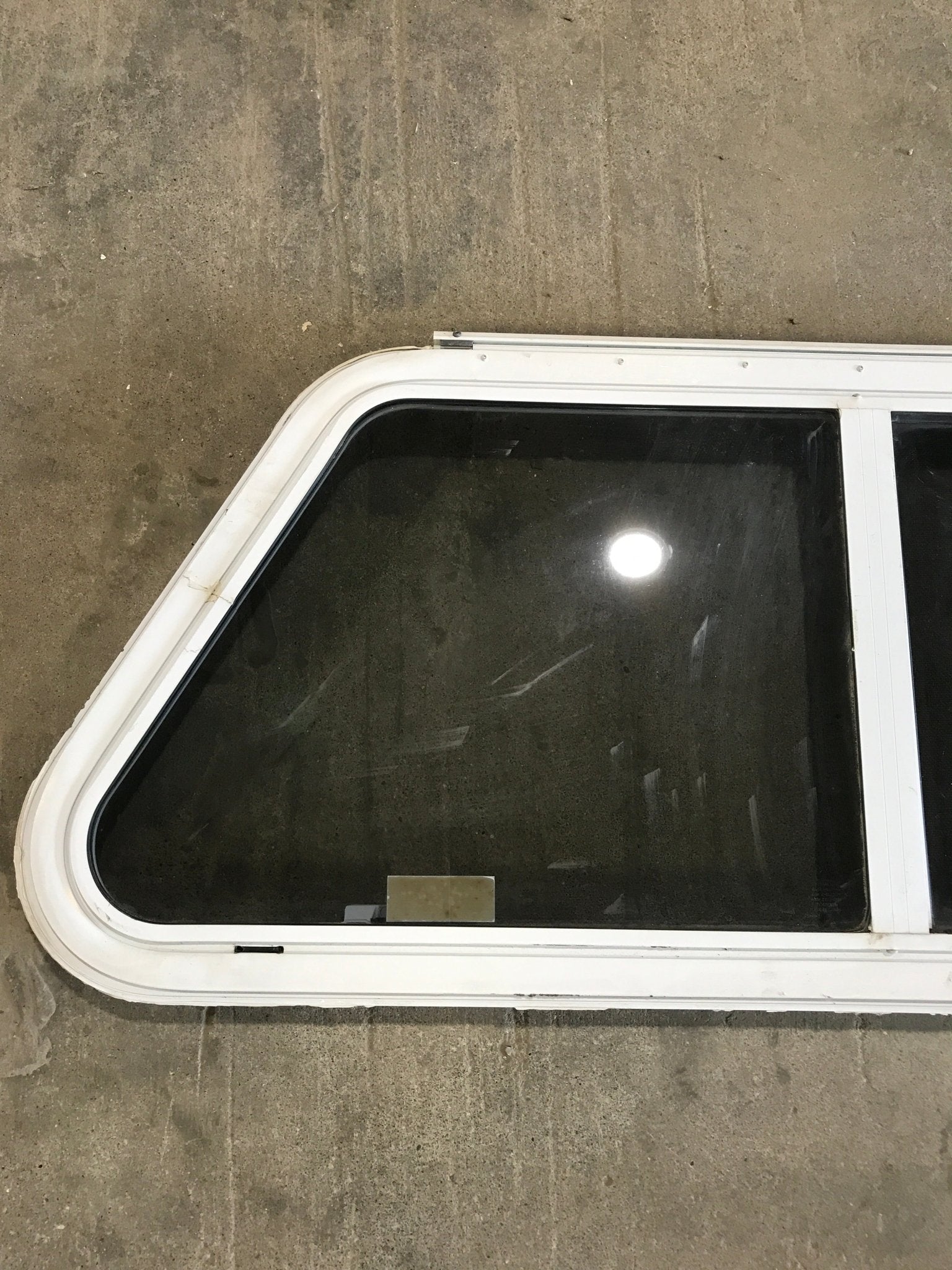 Used Slanted White Radius Emergency Opening Window : 42