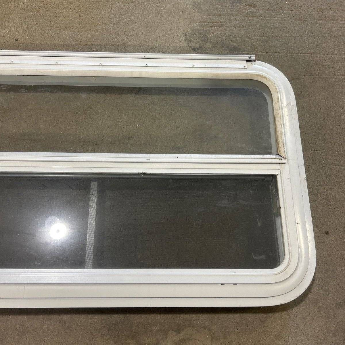 Used Slanted White Radius Emergency Opening Window - 49.25