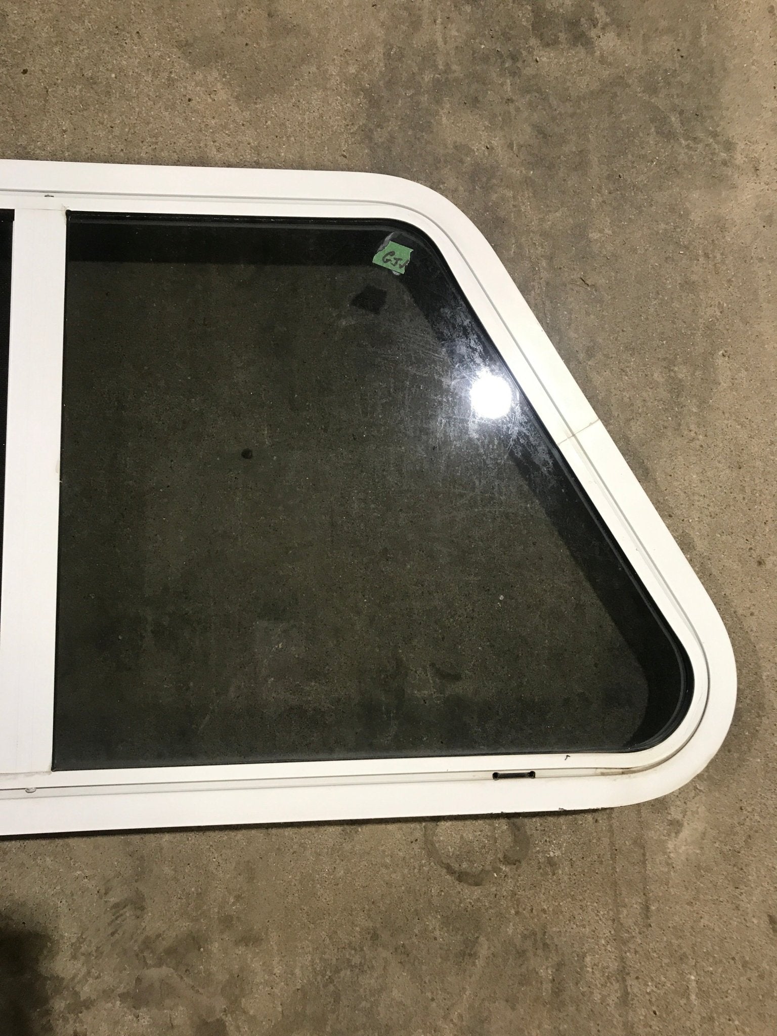 Used Slanted White Radius Opening Window : 37" W x 18 3/4" H x 1 7/8" D - Young Farts RV Parts