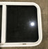 Used Slanted White Radius Opening Window : 37" W x 18 3/4" H x 1 7/8" D - Young Farts RV Parts