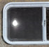 Used Slanted White Radius Opening Window : 41 3/4" W x 17 1/2" H x 1 7/8" D - Young Farts RV Parts