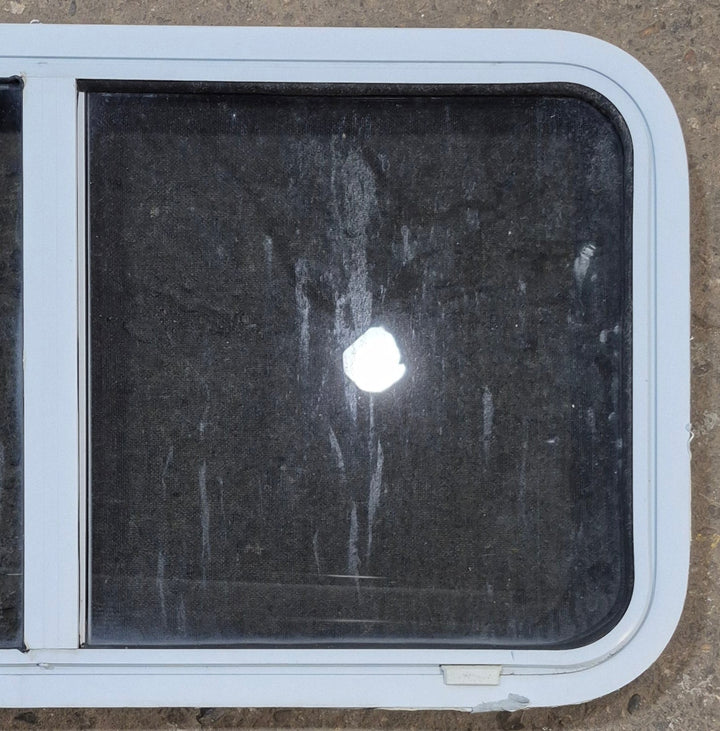 Used Slanted White Radius Opening Window : 41 3/4" W x 18 3/4" H x 1 7/8" D - Young Farts RV Parts