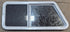 Used Slanted White Radius Opening Window : 42" W x 17 1/2" H x 1 7/8" D - Young Farts RV Parts