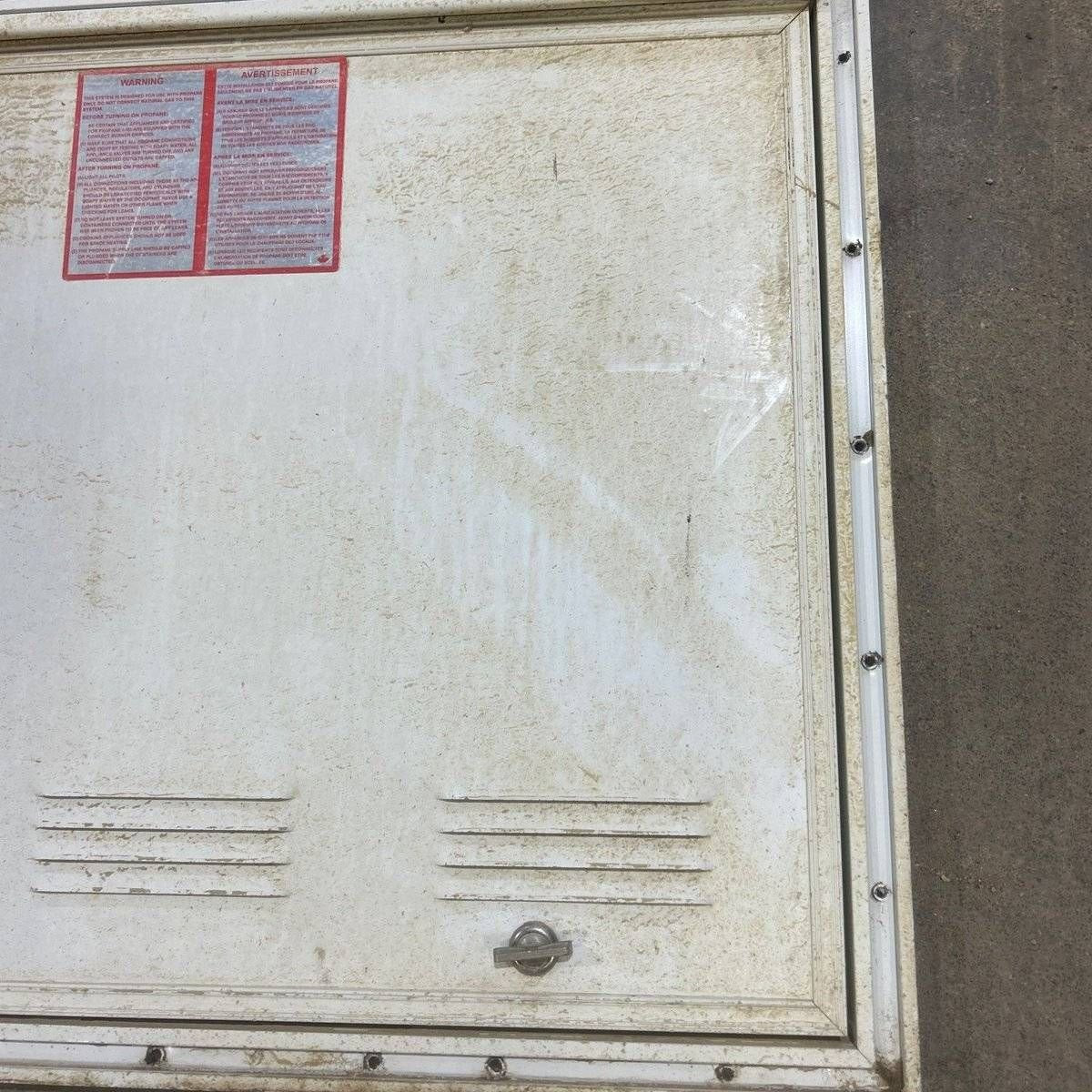 USED Square Corner Propane cargo door - 25.25 X 19.75 X 0.625 - Young Farts RV Parts