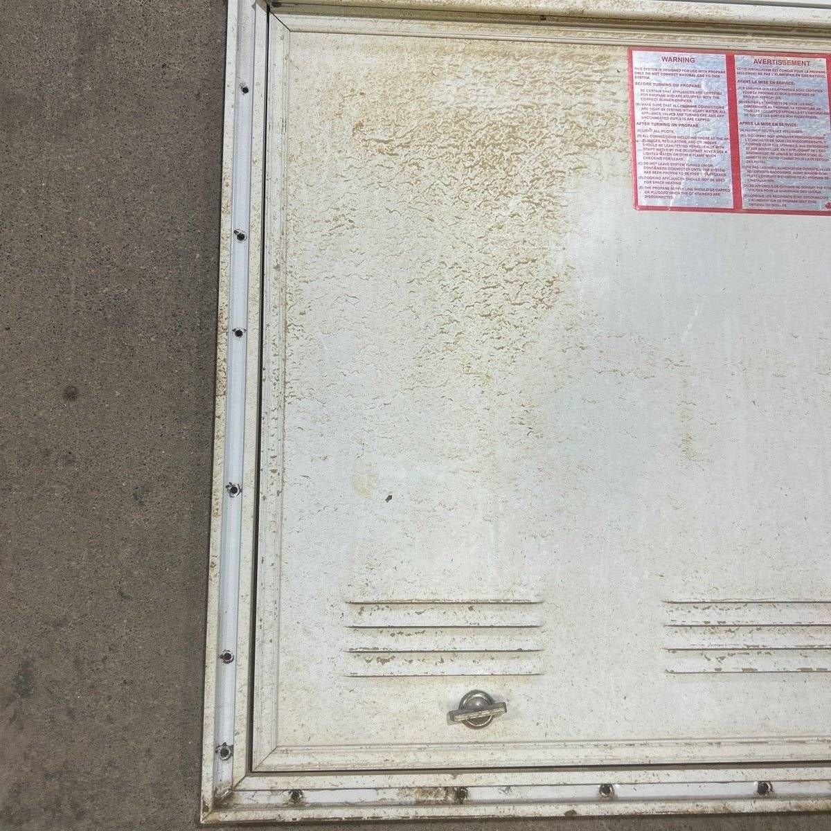 USED Square Corner Propane cargo door - 25.25 X 19.75 X 0.625 - Young Farts RV Parts