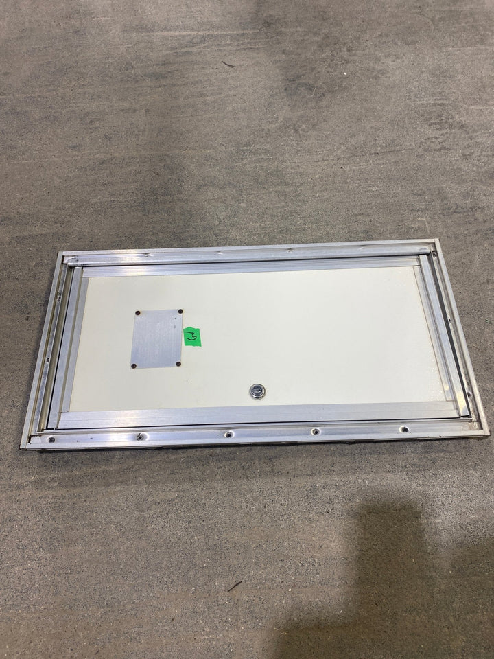 Used Square Cornered Cargo Door 10 1/2" W x 22 1/2 H x 1" D - Young Farts RV Parts