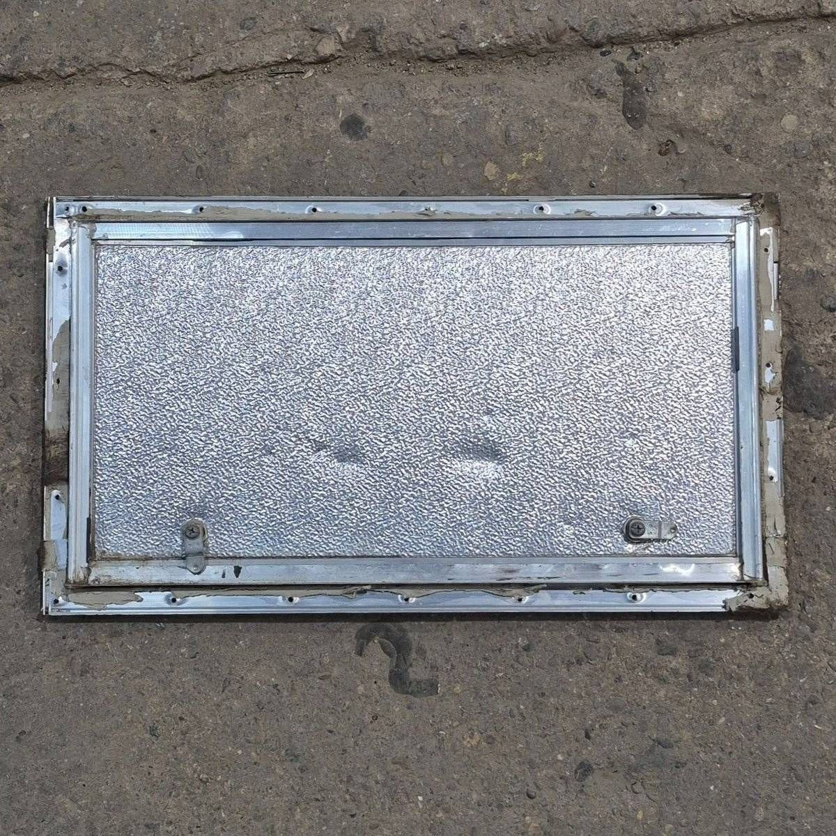 Used Square Cornered Cargo Door - 23.875 X 12.625 X 0.625 - Young Farts RV Parts