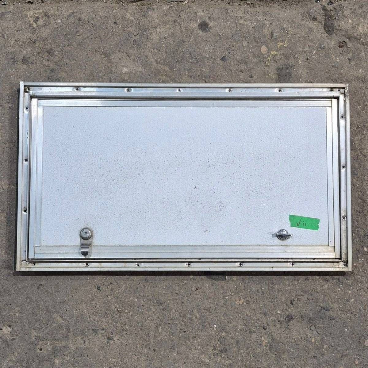 Used Square Cornered Cargo Door - 23.875 X 12.625 X 0.625 - Young Farts RV Parts