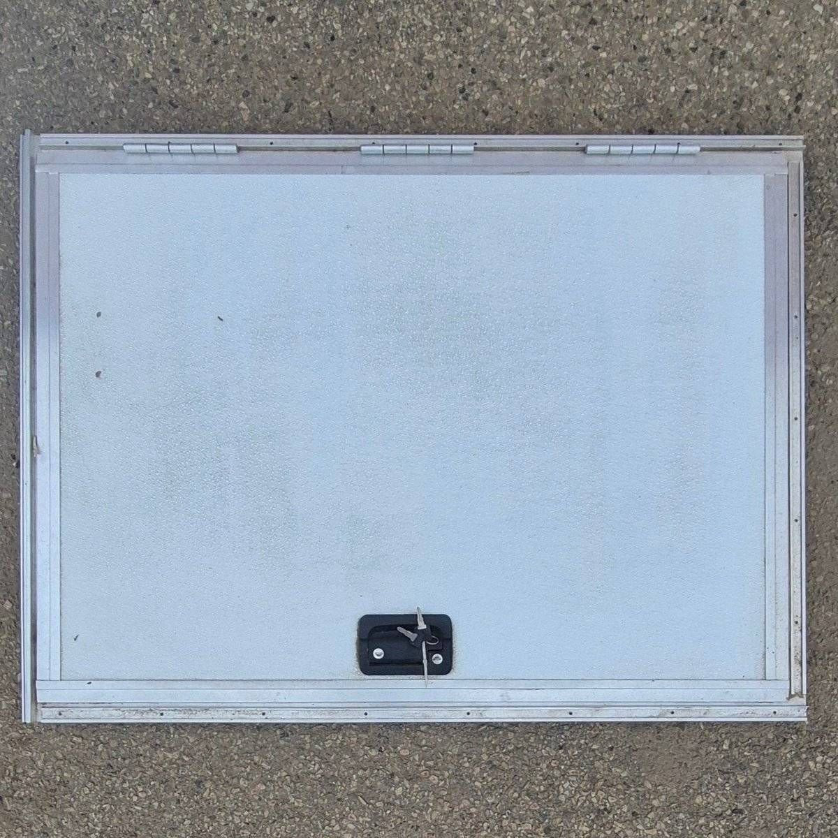 Used Square Cornered Cargo Door - 43 5/8" X 31 1/2" X 1 1/2" - Young Farts RV Parts
