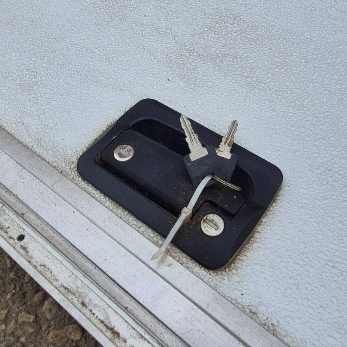 Used Square Cornered Cargo Door - 43 5/8" X 31 1/2" X 1 1/2" - Young Farts RV Parts