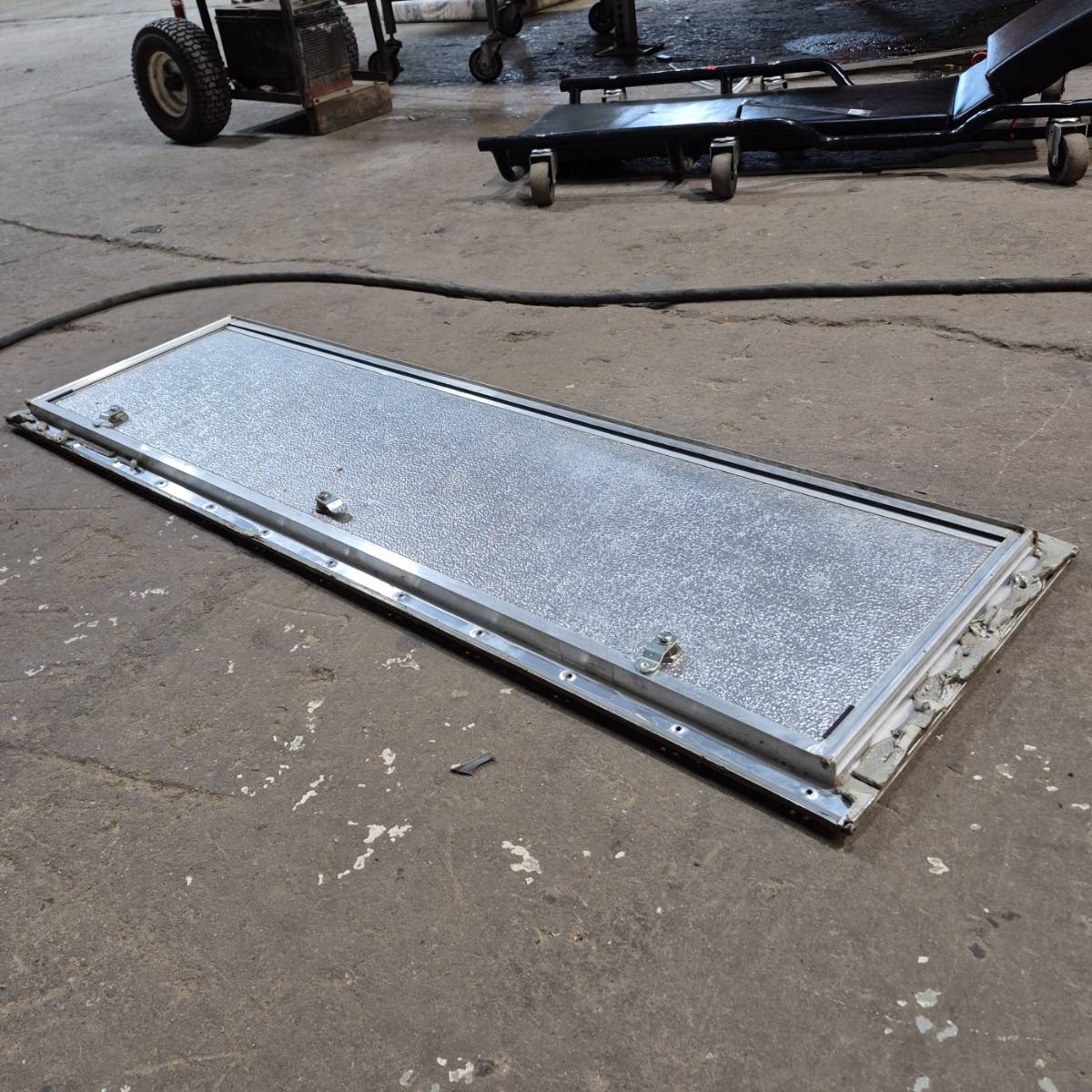 Used Square Cornered Cargo Door - 46.75 X 12.75 X .75 - Young Farts RV Parts