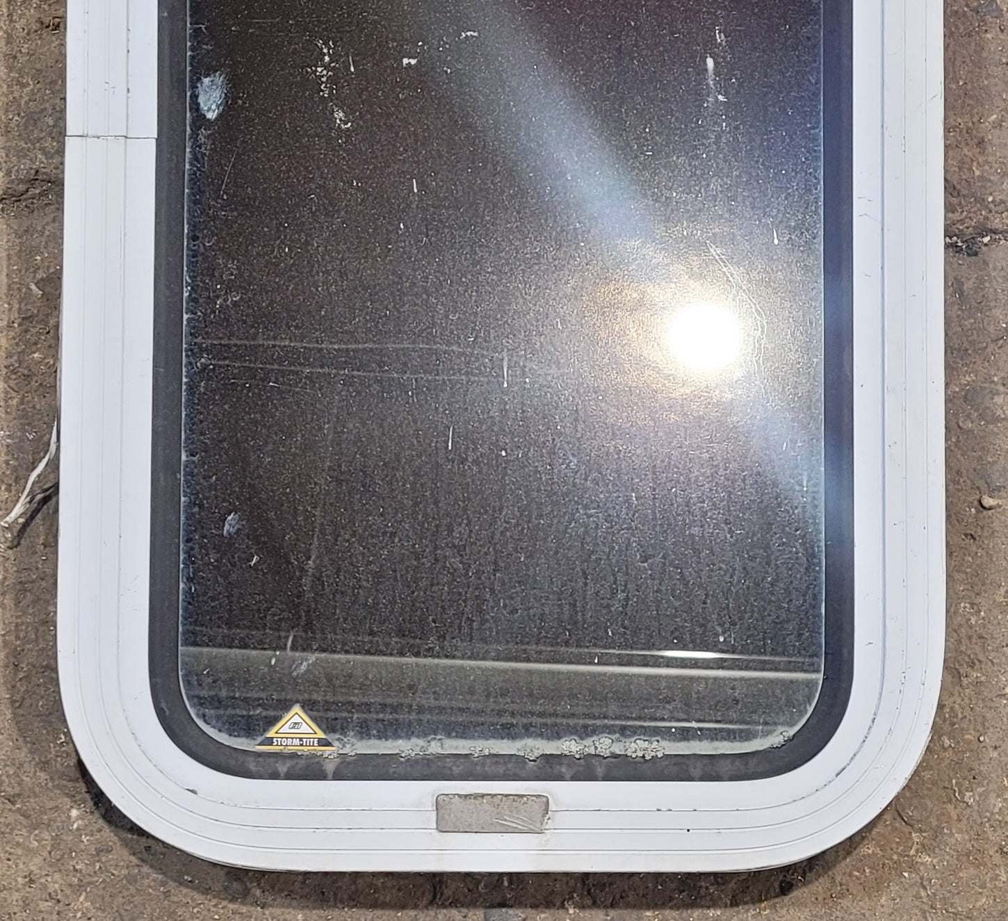 Used White Radius Non Opening Window : 13 1/2" W x 23 1/2" H x 1 7/8" D - Young Farts RV Parts