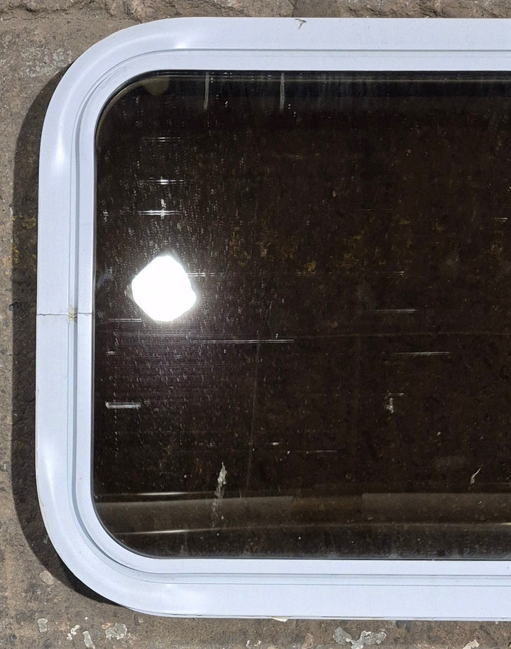 Used White Radius Non Opening Window : 24 1/4" W x 16 3/4" H x 1 7/8" D - Young Farts RV Parts