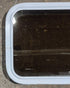 Used White Radius Non Opening Window : 24 1/4" W x 16 3/4" H x 1 7/8" D - Young Farts RV Parts
