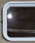 Used White Radius Non Opening Window : 24 1/4" W x 16 3/4" H x 1 7/8" D - Young Farts RV Parts