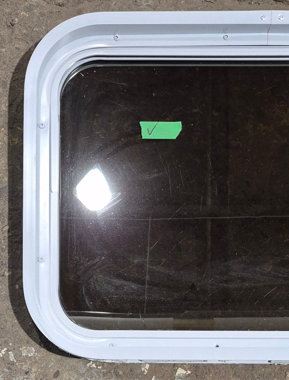 Used White Radius Non Opening Window : 24 1/4" W x 16 3/4" H x 1 7/8" D - Young Farts RV Parts