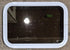 Used White Radius Non Opening Window : 24 1/4" W x 16 3/4" H x 1 7/8" D - Young Farts RV Parts