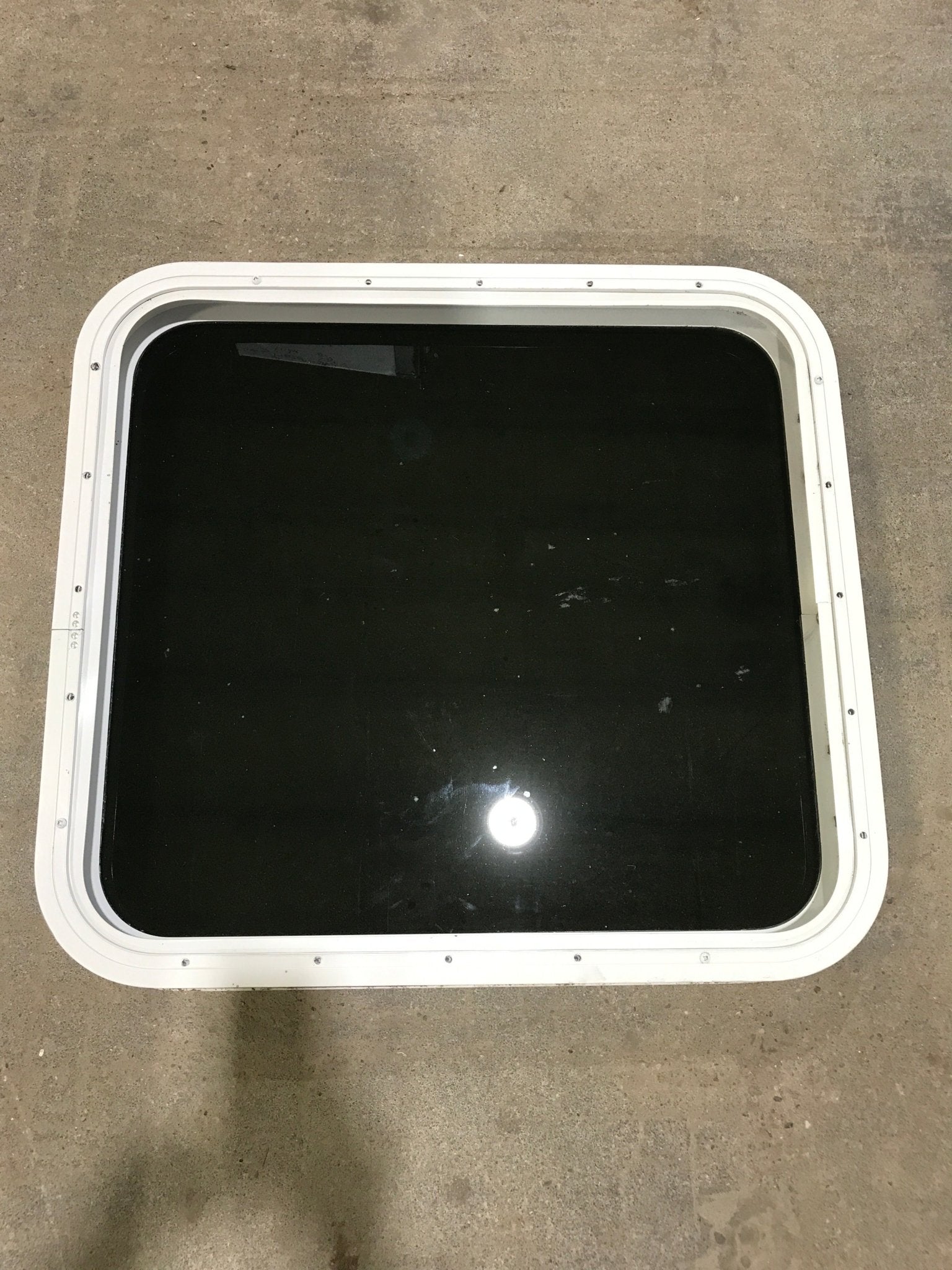 Used White Radius Non Opening Window : 25 1/2" W x 23 1/2" H x 1 3/4" D - Young Farts RV Parts