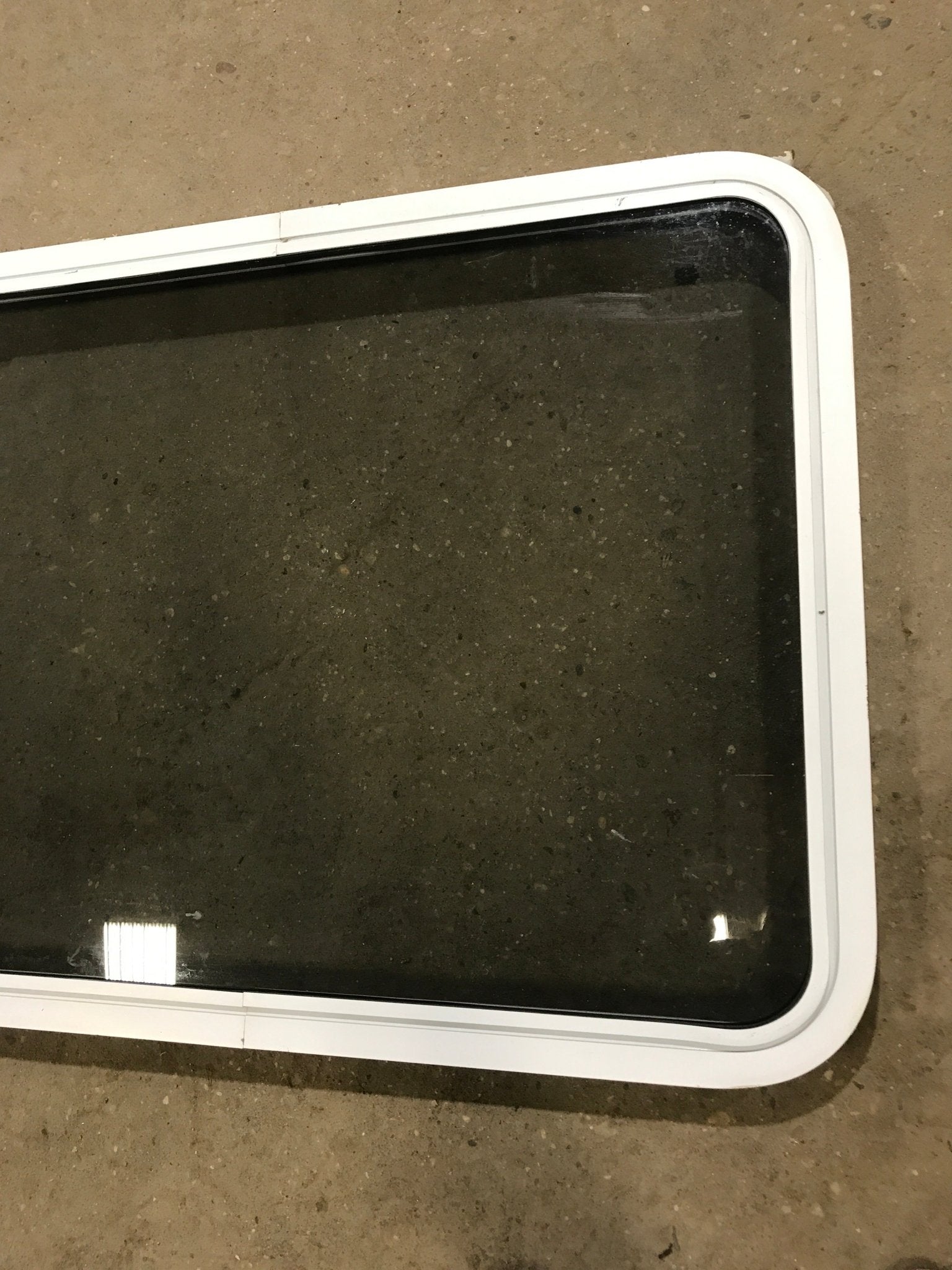 Used White Radius Non Opening Window : 35 3/4" W x 26 1/4" H x 1 7/8" D - Young Farts RV Parts