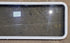 Used White Radius Non Opening Window : 54 1/4" W x 21 3/4" H x 1 7/8" D - Young Farts RV Parts