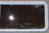 Used White Radius Non Opening Window : 60 1/4" W x 21 3/4" H x 1 7/8" D - Young Farts RV Parts
