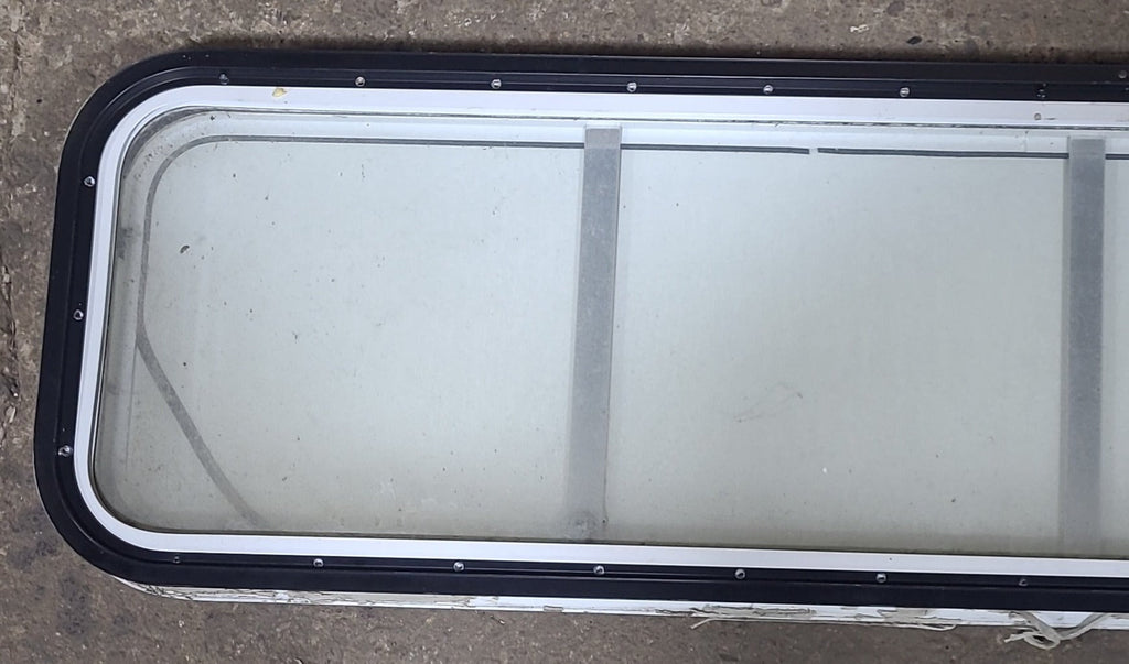 Used White Radius Non-Opening Window With Rock Guard Cover : 59 1/4" W x 14 1/4" H x 1 7/8" D - Young Farts RV Parts