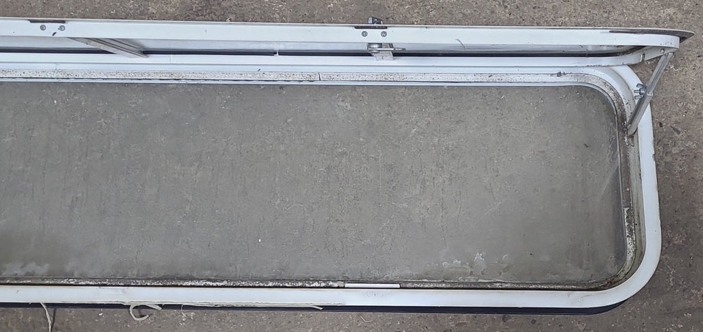 Used White Radius Non-Opening Window With Rock Guard Cover : 59 1/4" W x 14 1/4" H x 1 7/8" D - Young Farts RV Parts