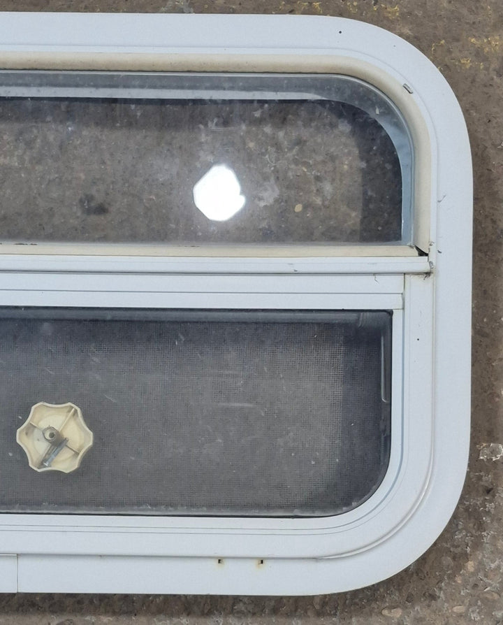 Used White Radius Opening Window : 23 1/2" W x 14 1/2" H x 1 7/8" D - Young Farts RV Parts
