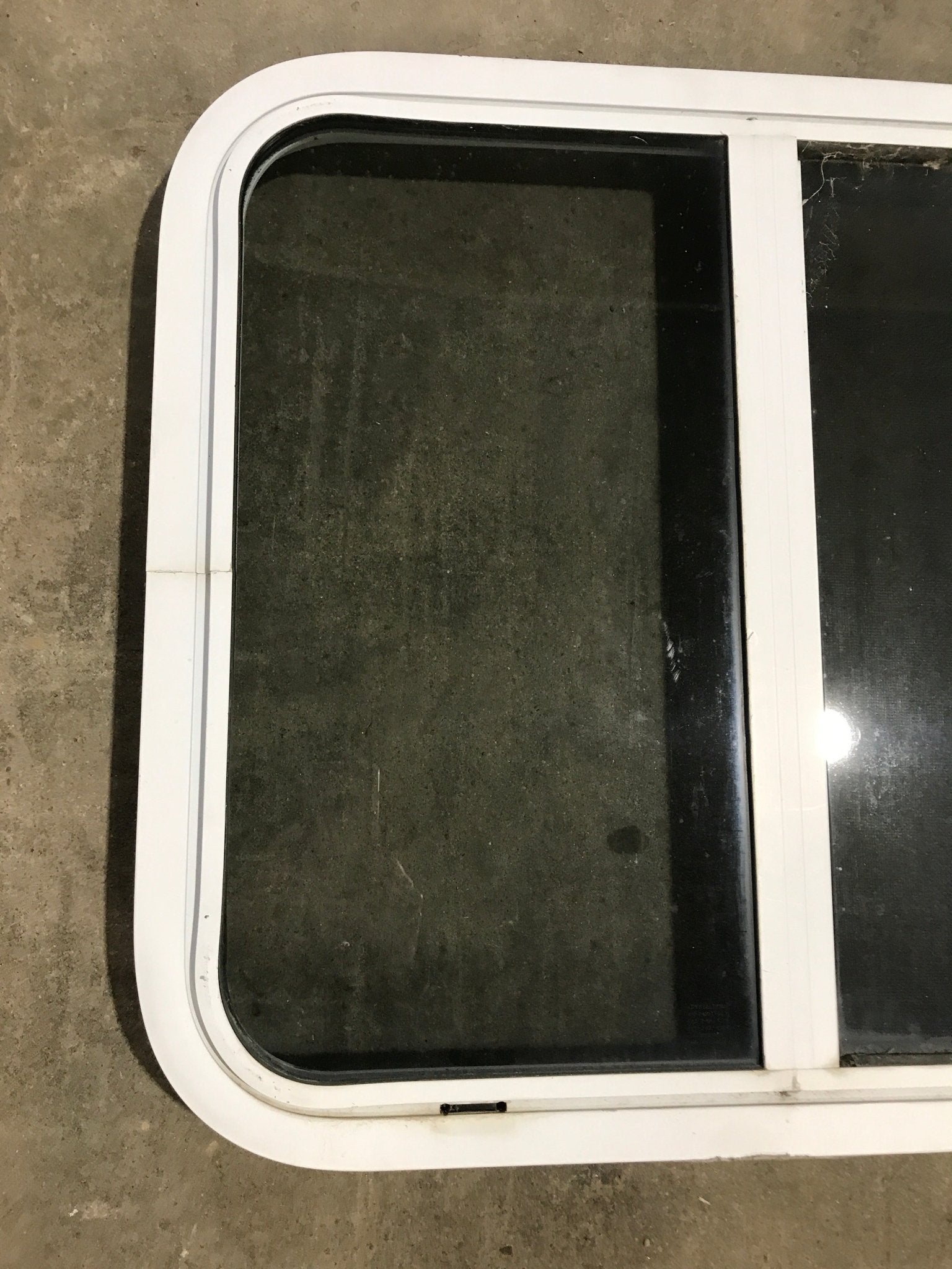 Used White Radius Opening Window : 24 1/2" W x 21 1/2" H x 1 7/8" D - Young Farts RV Parts