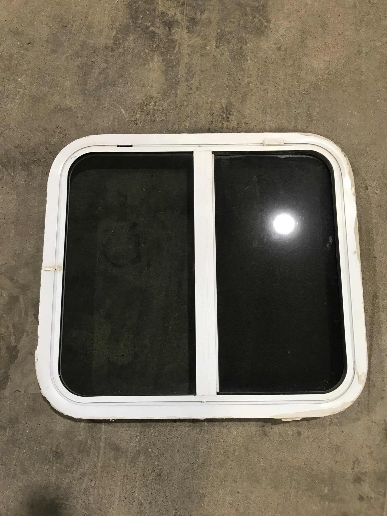 Used White Radius Opening Window : 24 1/4" W x 21 1/2" H x 2" D - Young Farts RV Parts