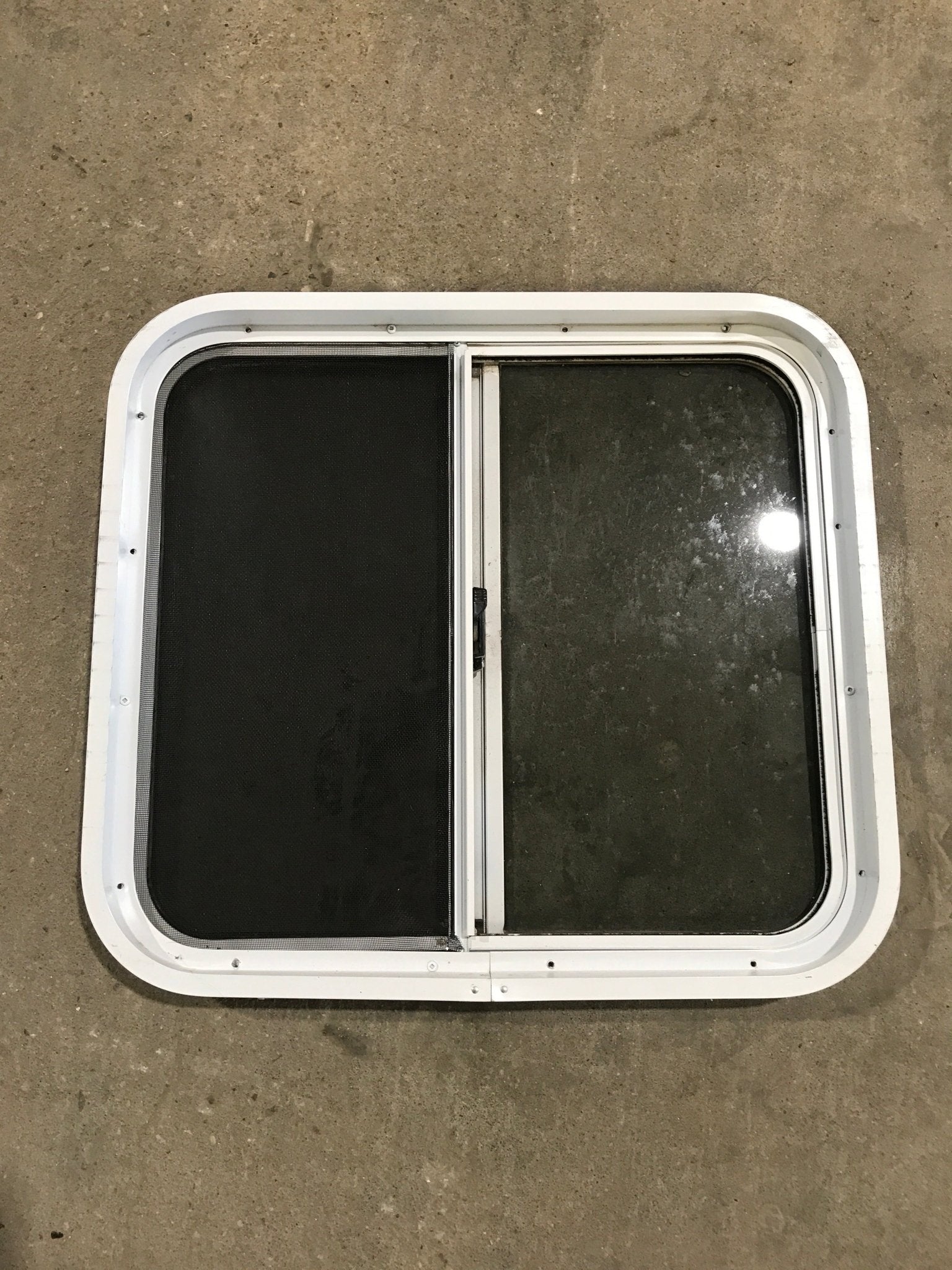 Used White Radius Opening Window : 24 1/4" W x 21 1/2" H x 2" D - Young Farts RV Parts