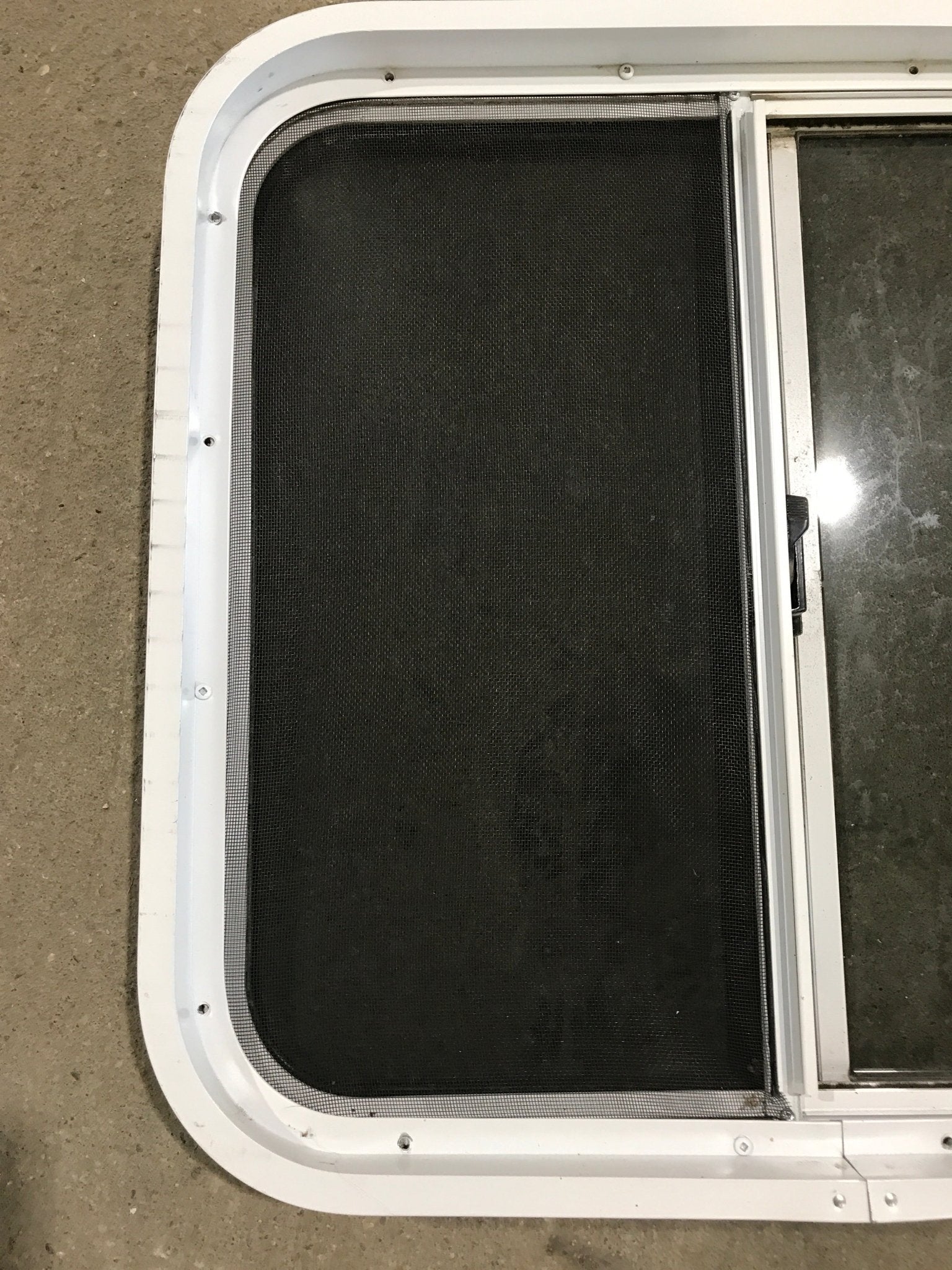 Used White Radius Opening Window : 24 1/4" W x 21 1/2" H x 2" D - Young Farts RV Parts
