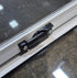Used White Radius Opening Window : 24 1/4" W x 21 3/4" H x 1 7/8" D - Young Farts RV Parts