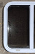 Used White Radius Opening Window : 24 1/4" W x 21 3/4" H x 1 7/8" D - Young Farts RV Parts