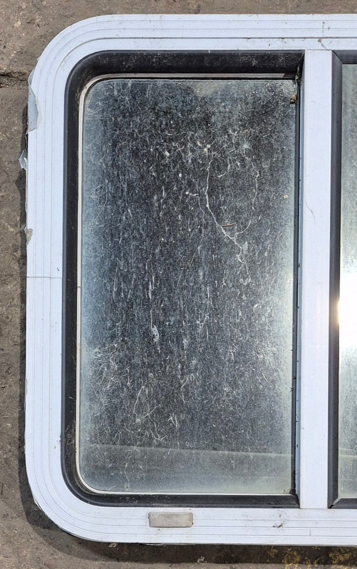 Used White Radius Opening Window : 24" W x 21 1/2" H x 1 7/8" D - Young Farts RV Parts