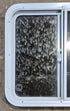 Used White Radius Opening Window : 24" W x 21 1/2" H x 1 7/8" D - Young Farts RV Parts