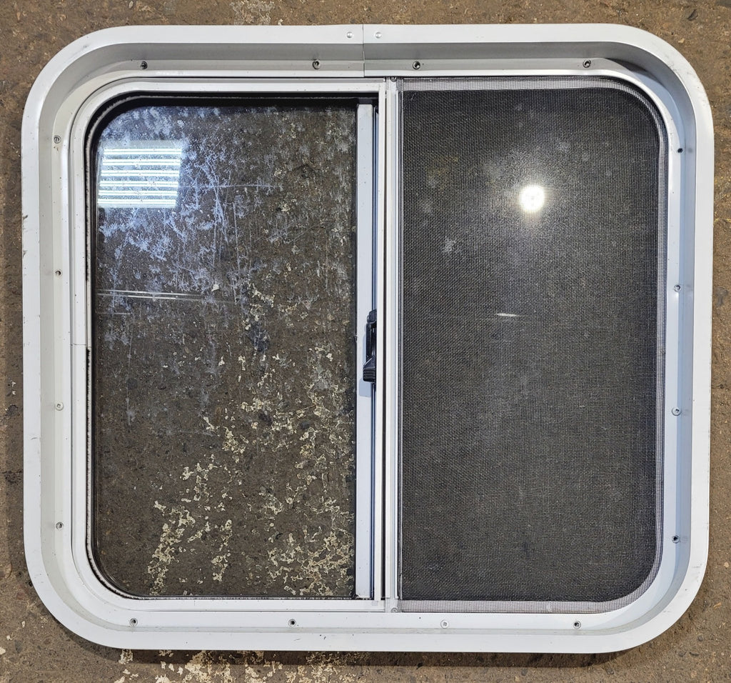 Used White Radius Opening Window : 24" W x 21 3/4" H x 1 7/8" D - Young Farts RV Parts