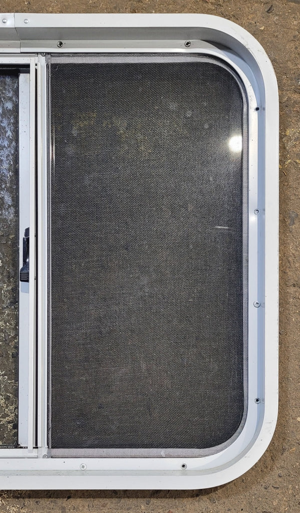 Used White Radius Opening Window : 24" W x 21 3/4" H x 1 7/8" D - Young Farts RV Parts