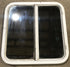 Used White Radius Opening Window : 25 1/2" W x 25 1/2" H x 1 7/8" D - Young Farts RV Parts