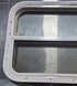 Used White Radius Opening Window : 29 1/2" W x 17 1/2" H x 1 7/8" D - Young Farts RV Parts