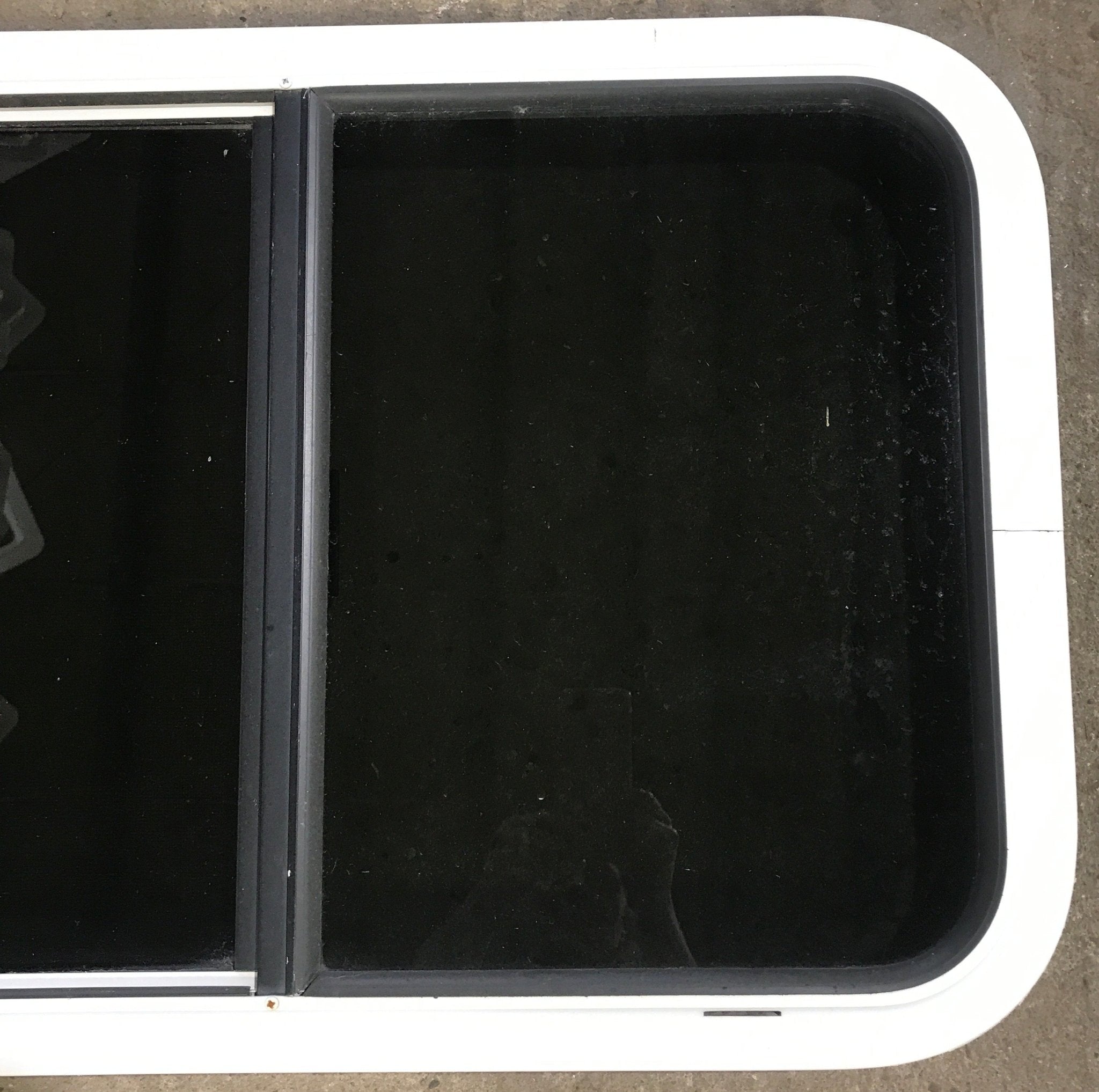Used White Radius Opening Window : 29 1/2" W x 19 1/2" H x 1 7/8" D - Young Farts RV Parts