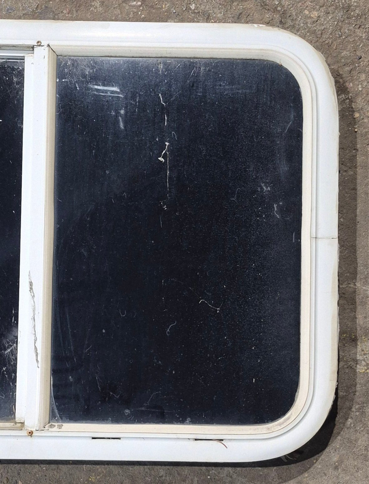 Used White Radius Opening Window : 29 1/2" W x 21 1/2" H x 1 7/8" D - Young Farts RV Parts