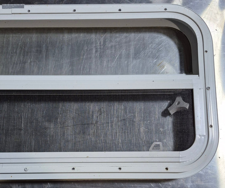 Used White Radius Opening Window : 35 1/2" W x 14 1/4" H x 1 1/4" D - Young Farts RV Parts