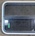 Used White Radius Opening Window : 41 1/4" W x 21 1/4" H x 1 3/4" D - Young Farts RV Parts